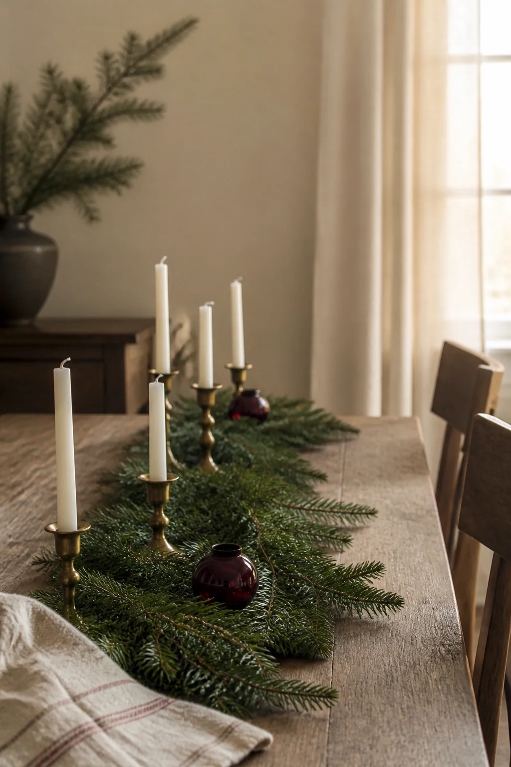 Run a slim evergreen garland down a narrow table